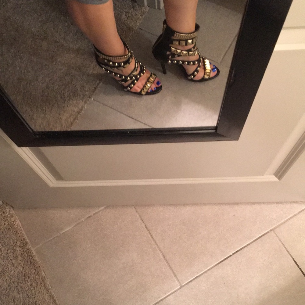 Black and gold heels